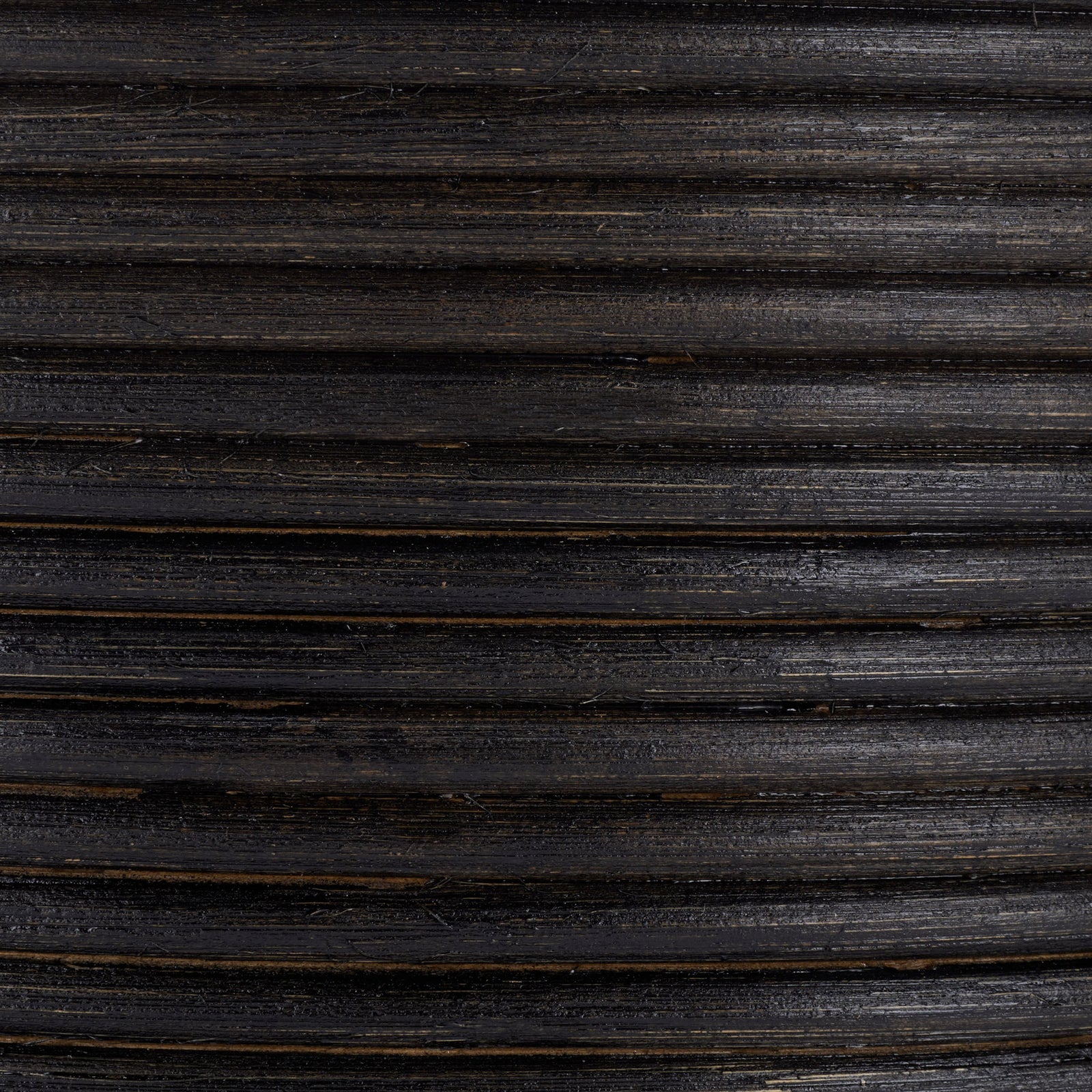Black rattan coils reveal subtle natural variation and a richly ribbed texture || STG1816A || swatch_studio