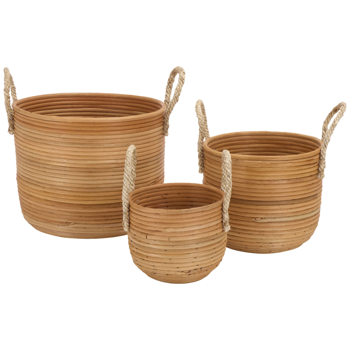Three natural rattan baskets combine rounded silhouettes, open tops, and woven loop handles. || STG1817A || front_studio