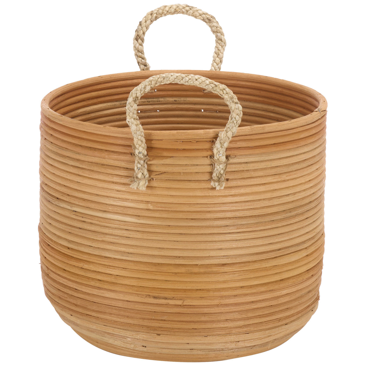 Braided loop handles rise from the natural rattan basket's textured, rounded sides. || STG1817A || side_partial_studio
