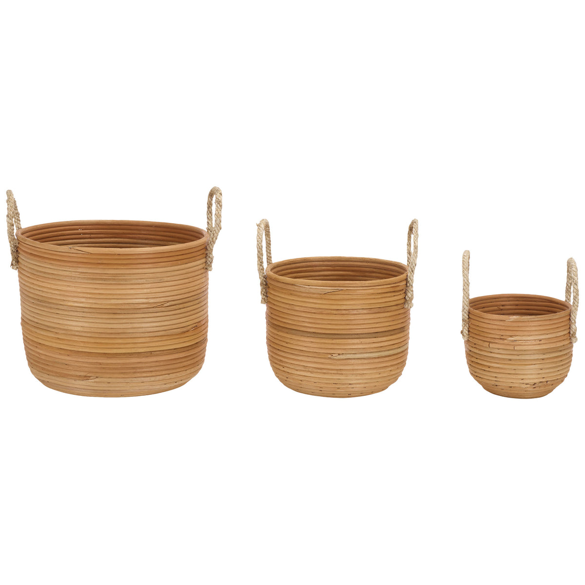 Graduated natural rattan baskets sit side by side, each with a broad opening and woven handles. || STG1817A || side_studio