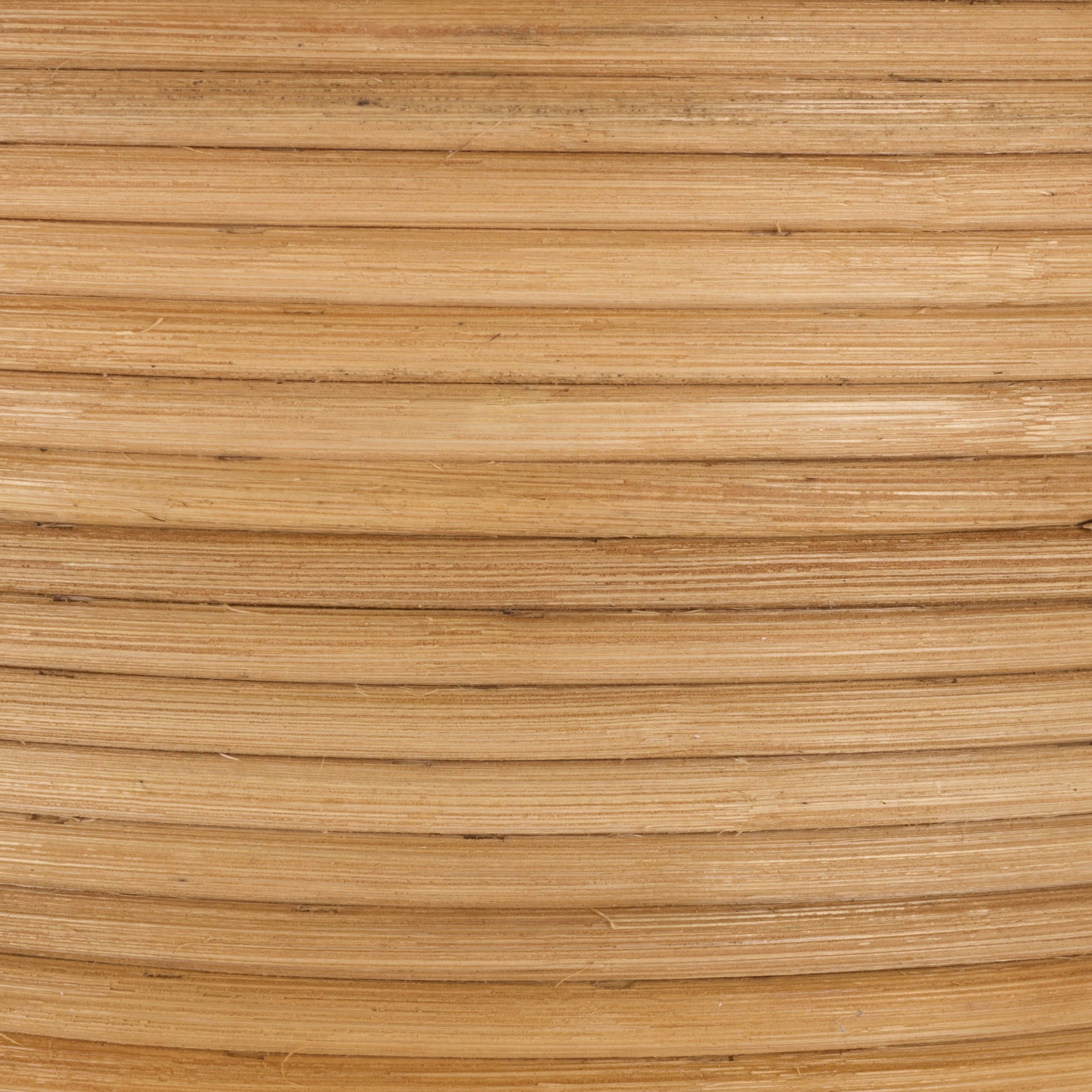 Warm tan tones and fine natural grain accent the basket's tightly coiled rattan. || STG1817A || swatch_studio