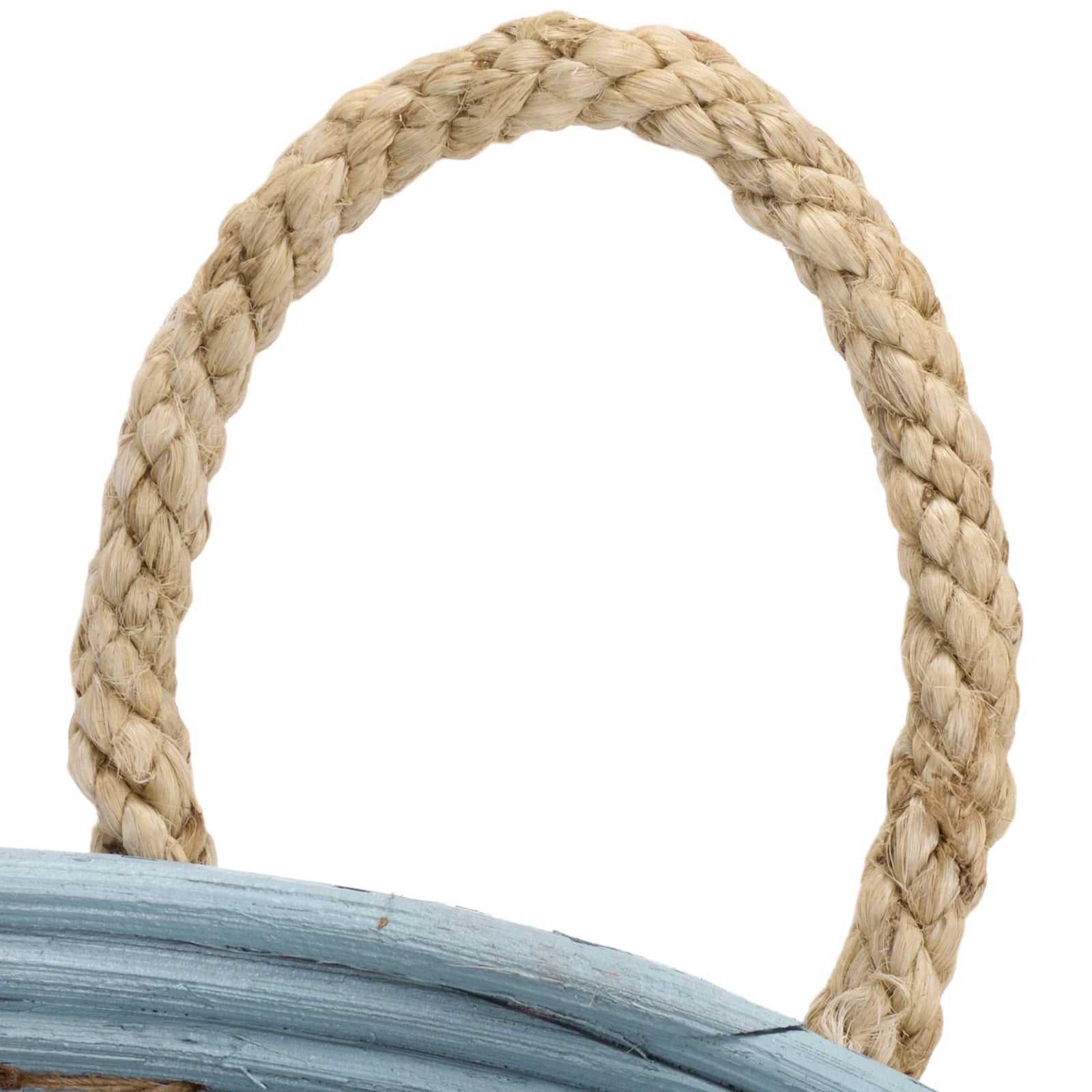 A looped braided handle brings warm natural texture to the light blue rattan basket. || STG1817B || handle_studio