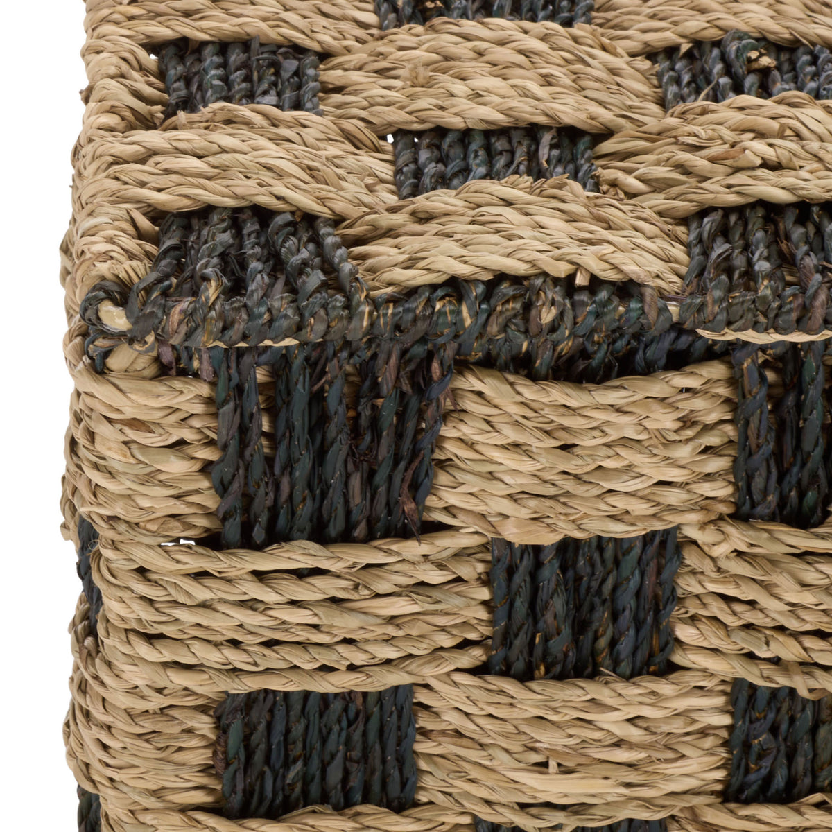 Thick braided strands form the basket's textured rim and contrasting checkerboard weave. || STG1822A || detail_studio