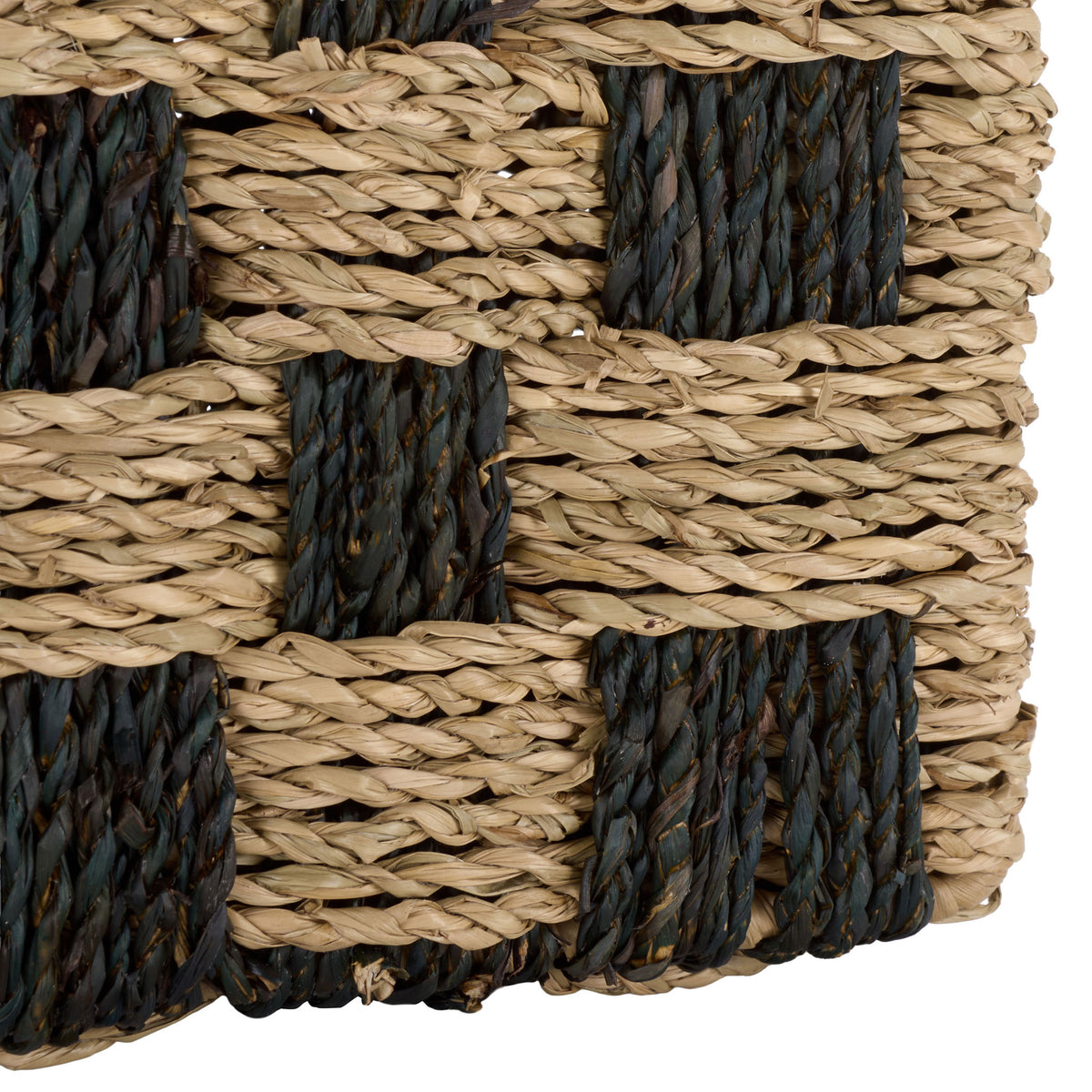 Natural and dark seagrass strands create a textured weave along the basket's lower edge. || STG1822A || detail_studio