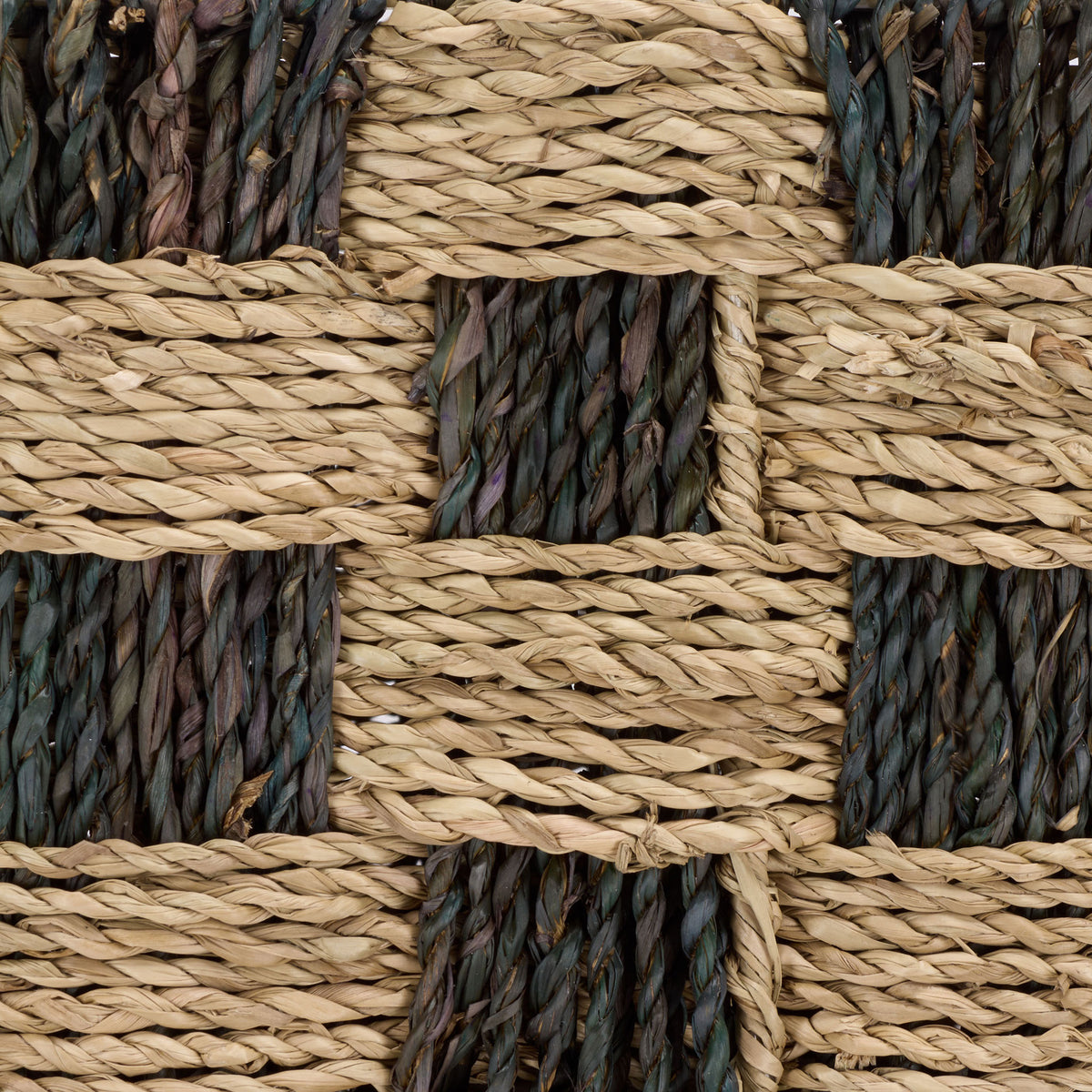 Interlaced natural and dark seagrass creates a tactile checkerboard pattern. || STG1822A || swatch_studio