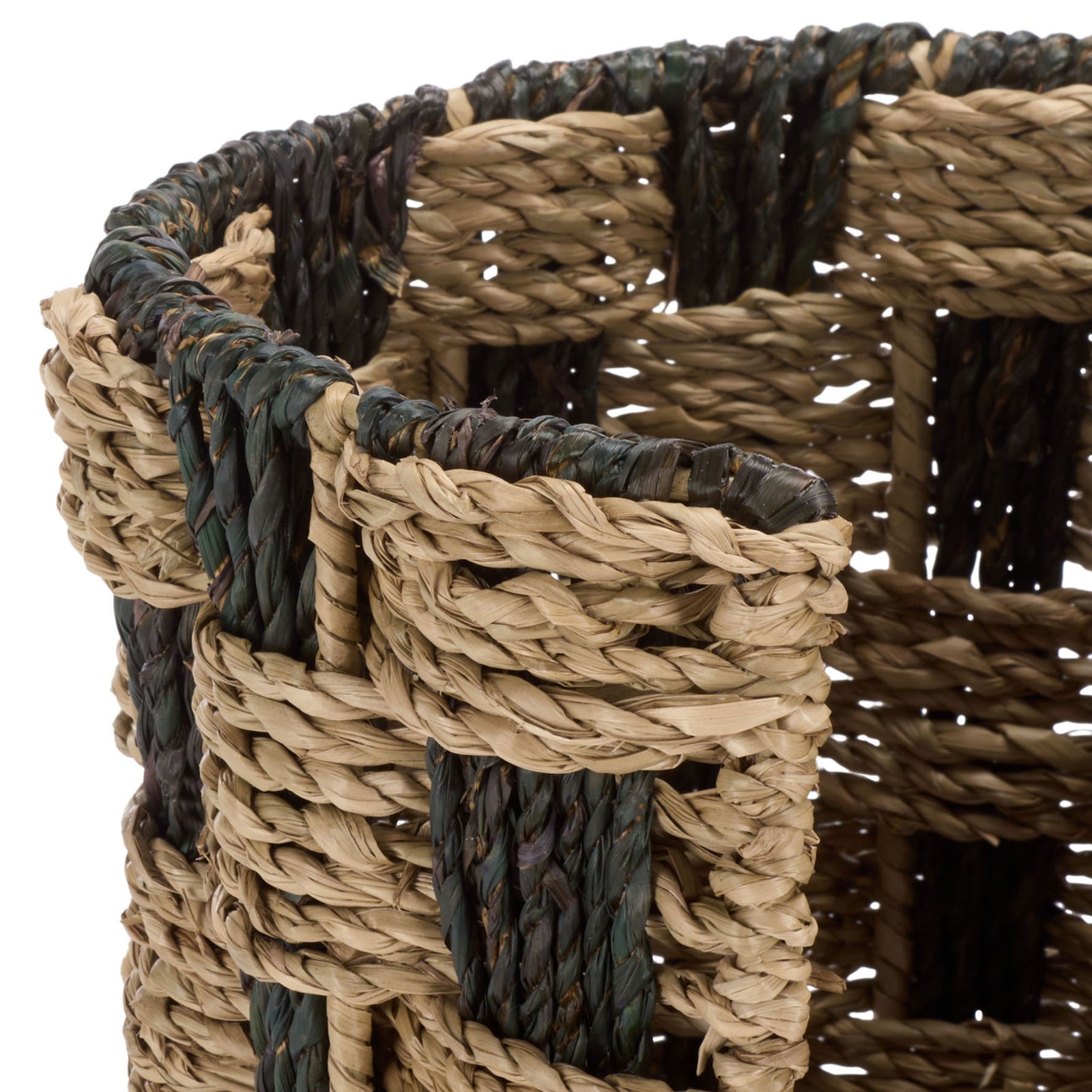 Thick braided seagrass frames the basket's opening in natural and dark tones. || STG1823A || detail_studio