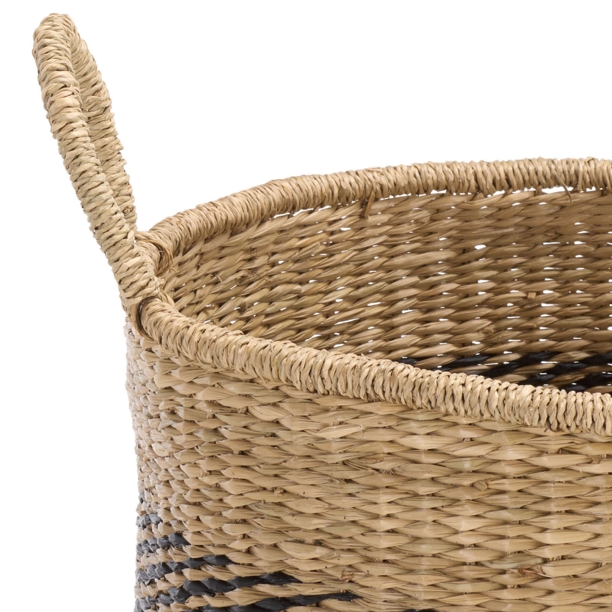 A thick woven rim frames the basket's open interior, with a wrapped handle and natural seagrass texture.