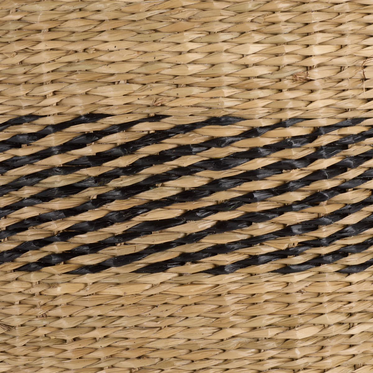 Natural and black seagrass fibers form a richly textured diagonal stripe. || STG1827A-SET3 || swatch_studio