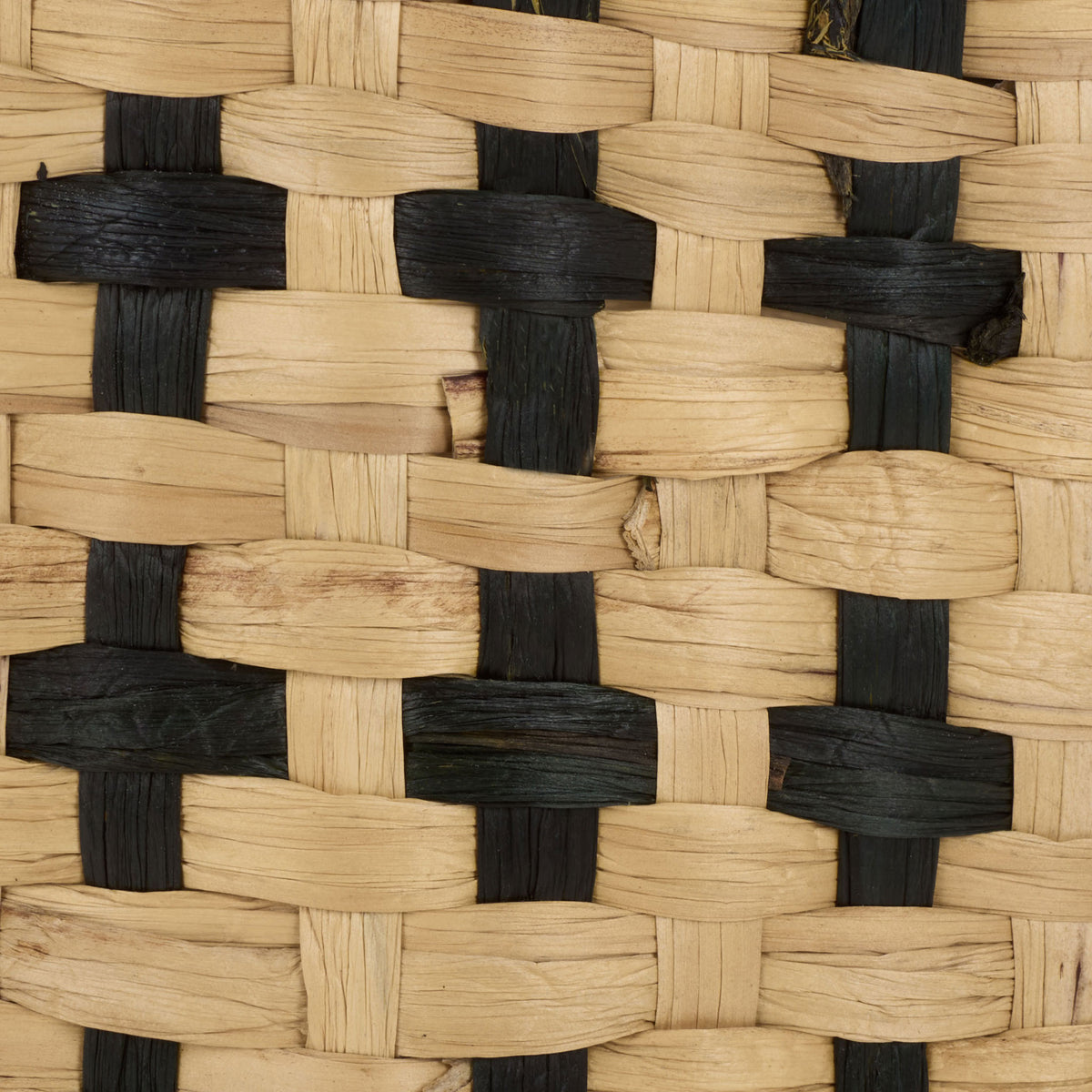 Natural and black water hyacinth fibers interlace in a textured basket weave. || STG1829A-SET2 || swatch_studio