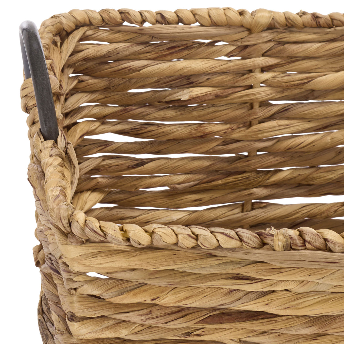 Braided water hyacinth lines the basket rim beside an airy weave and dark metal accent.