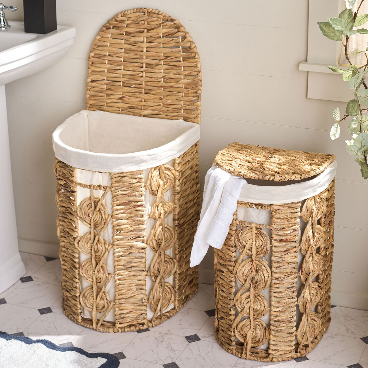A lifted lid reveals soft linen lining beside a matching basket holding a towel. || STG1831A-SET2 || front_open_room