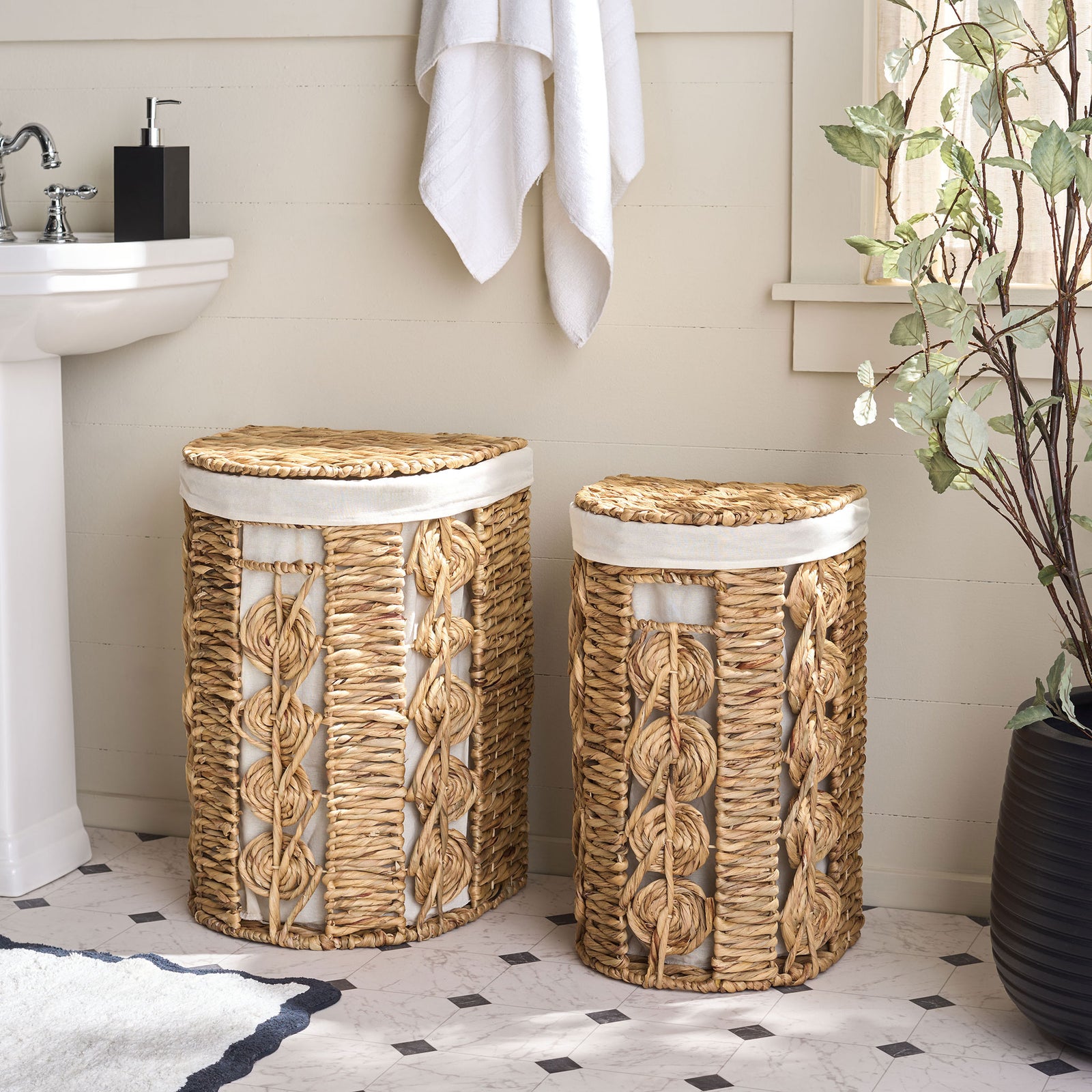 Matching woven baskets add natural warmth and practical storage to a bright bathroom. || STG1831A-SET2 || front_room