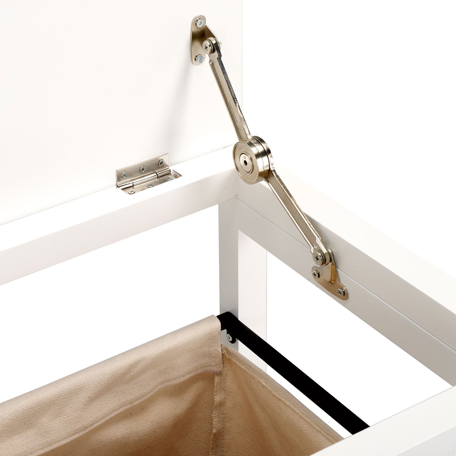 A metal support hinge holds the lifted white lid above a beige laundry bag. || STG1900A || detail_studio