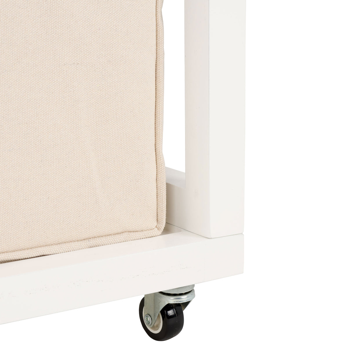 A black caster wheel and metal mount add easy mobility to the white hamper frame. || STG1900A || leg_studio