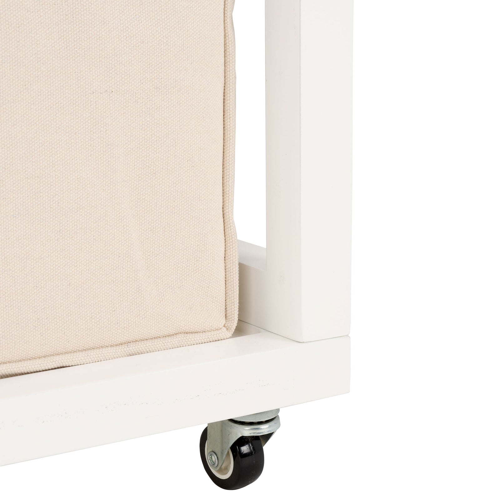 A black caster wheel and metal mount add easy mobility to the white hamper frame. || STG1900A || leg_studio