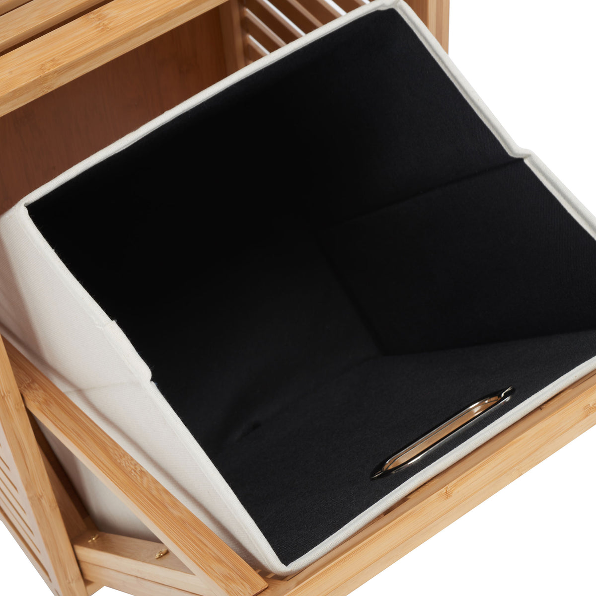 A spacious fabric-lined basket offers a convenient place to collect laundry beneath the shelves || STG1903A || storage_open_studio