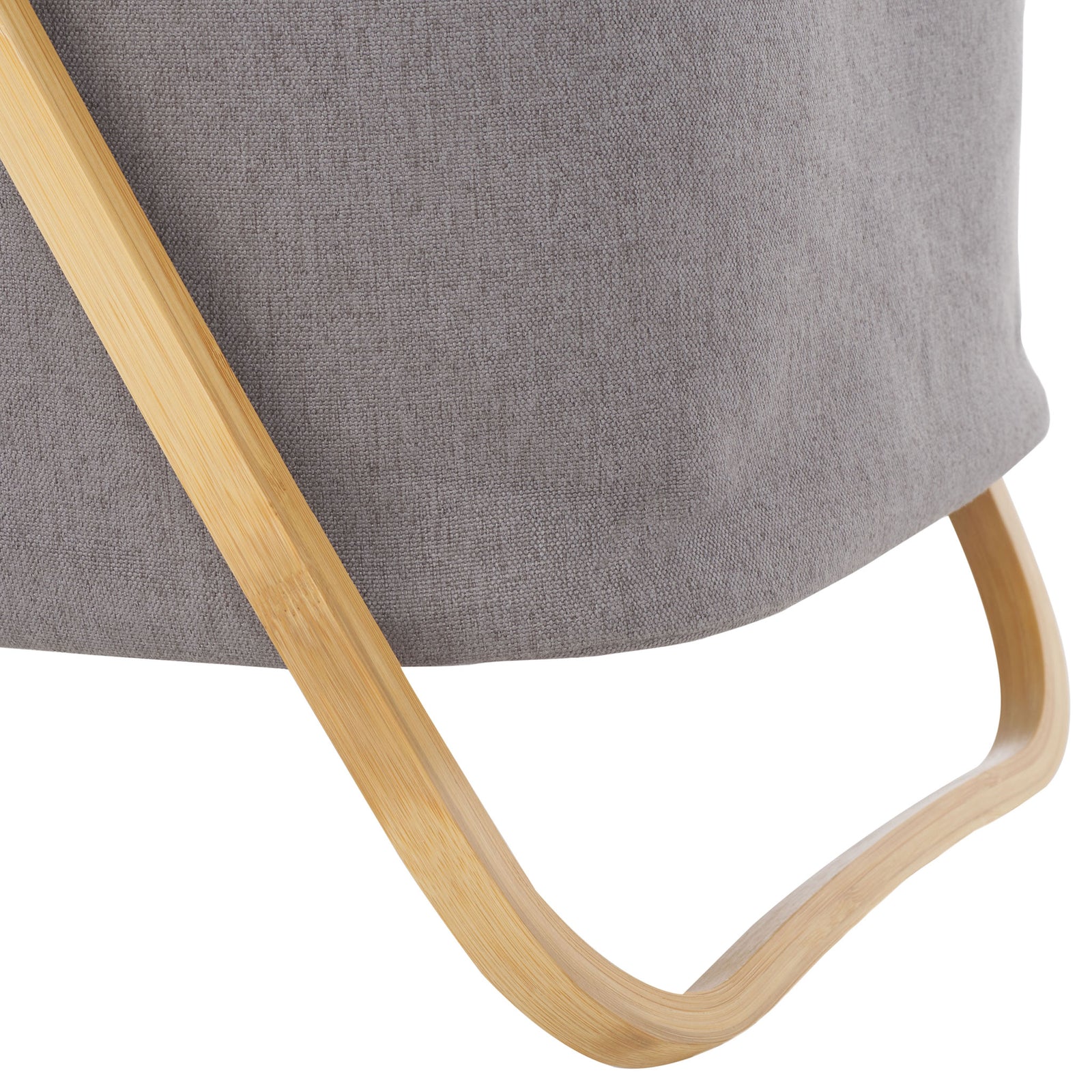 Curved natural bamboo legs form a smoothly rounded base beneath the gray fabric basket. || STG1906A || leg_studio