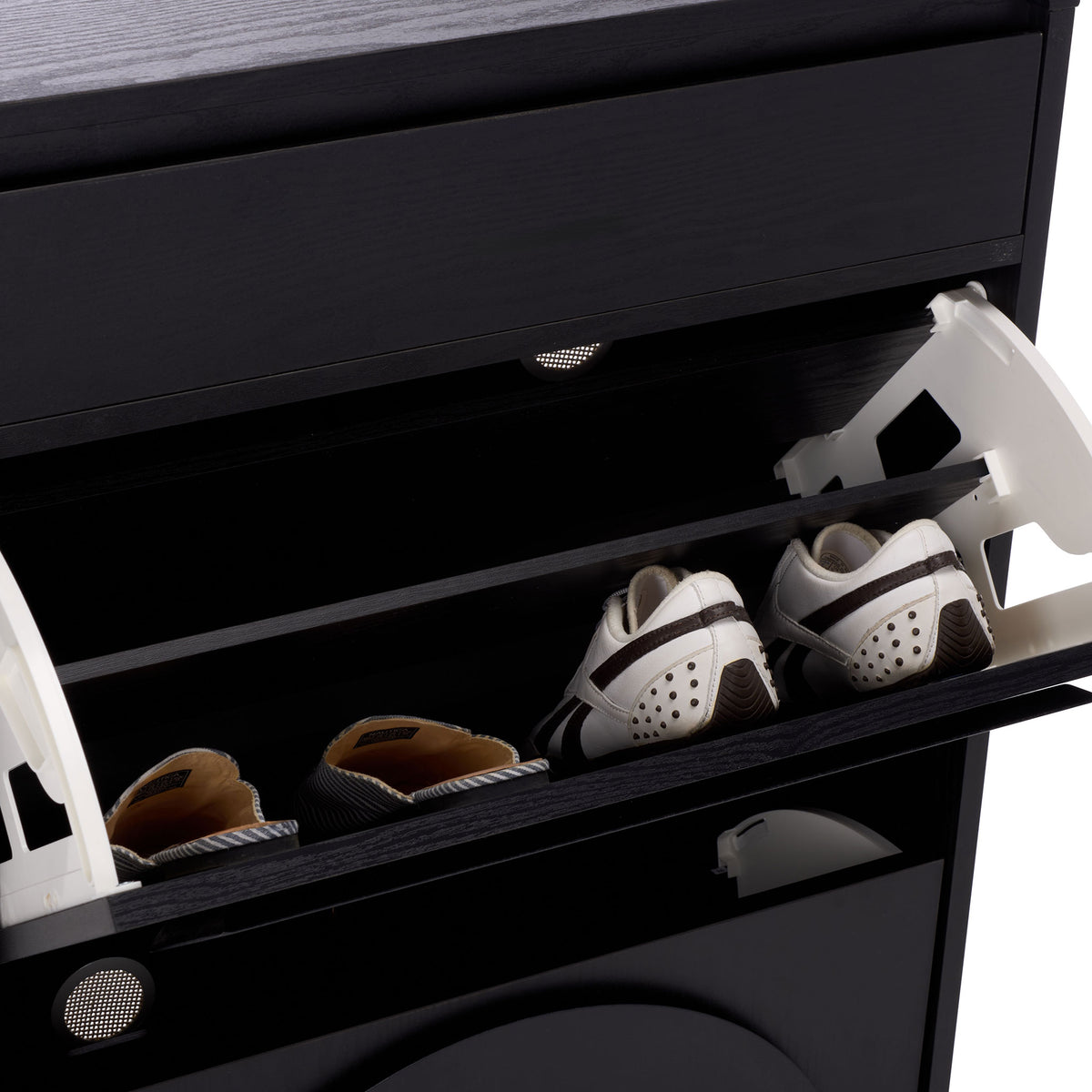 An open shoe bin holds sneakers and slip-ons beneath the cabinet's slim upper drawer. || STG3100B || storage_open_studio