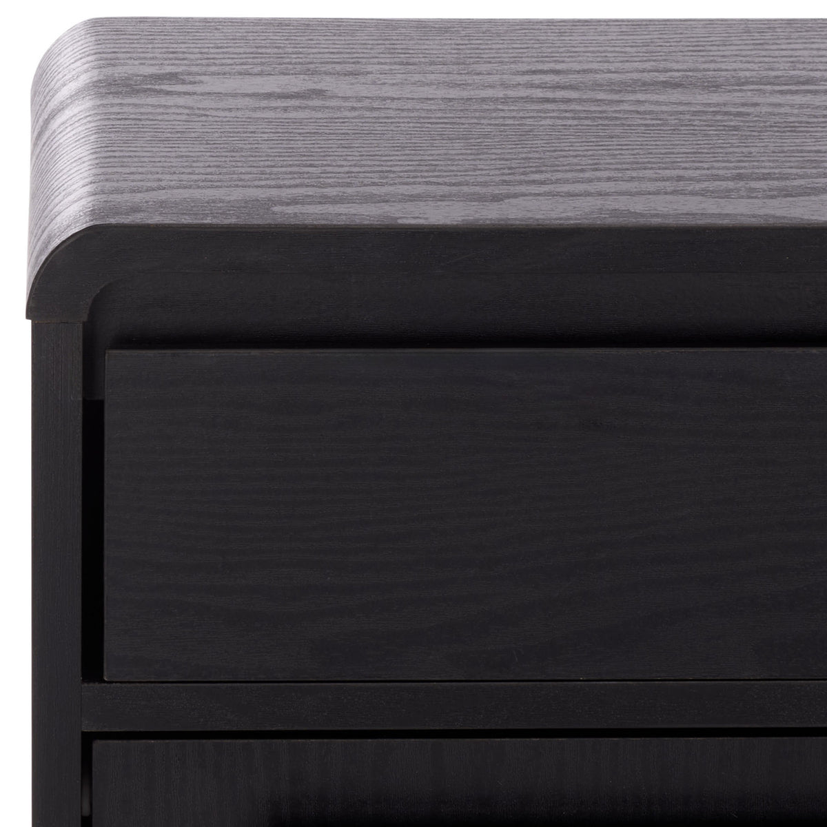 Gently rounded corners and subtle wood grain soften the cabinet's sleek black top. || STG3100B || detail_studio