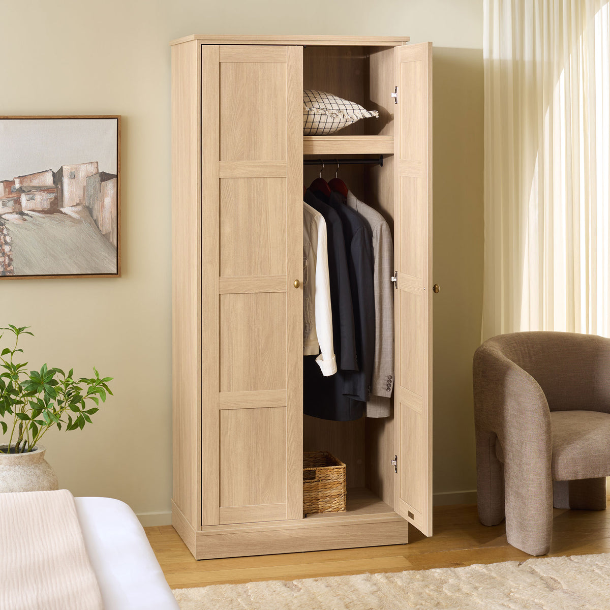 A top shelf sits above hanging clothes and basket space inside the wood-look wardrobe.