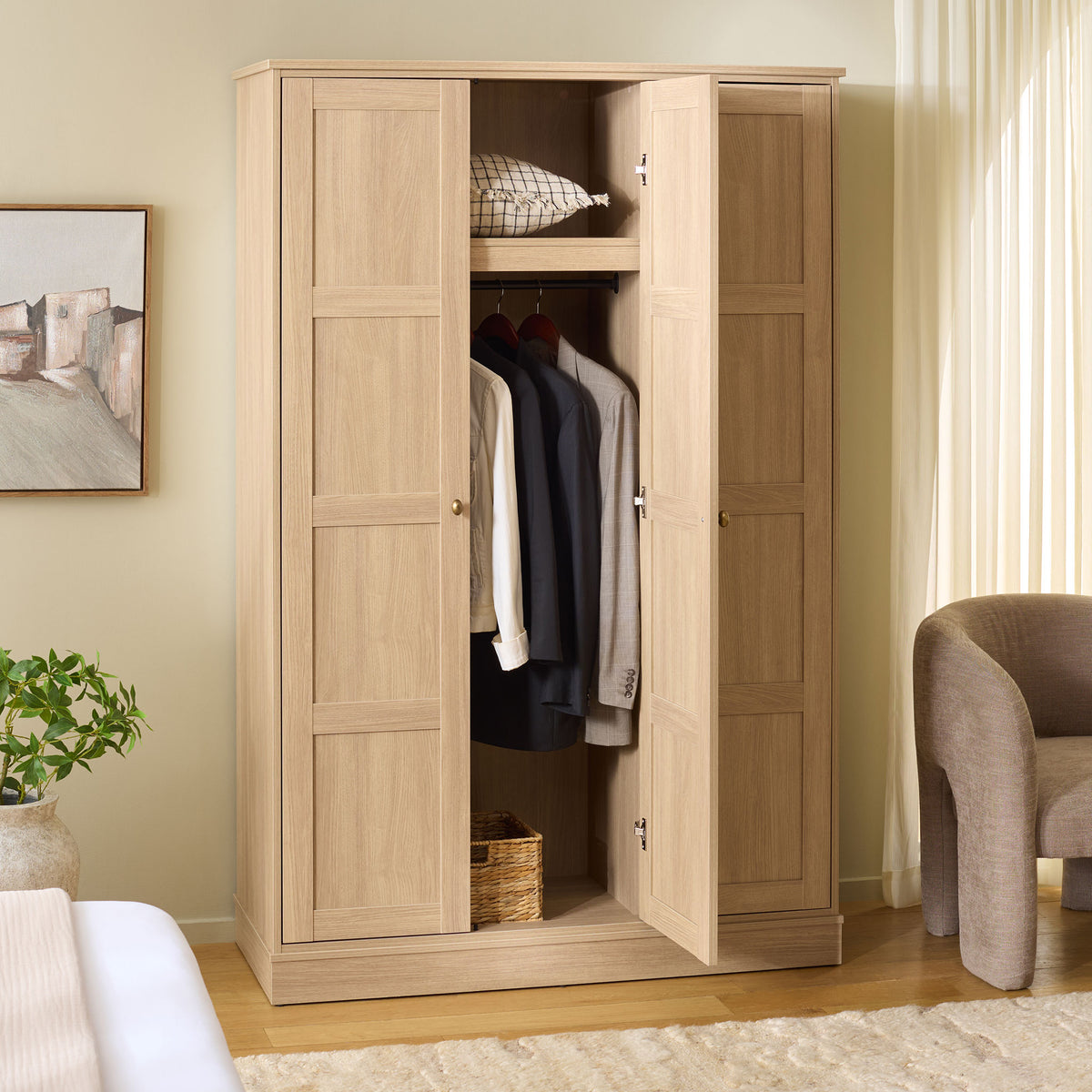 A center door opens onto an upper shelf and hanging space for coats and shirts. || STG3103B-3BX || front_angle_open_room