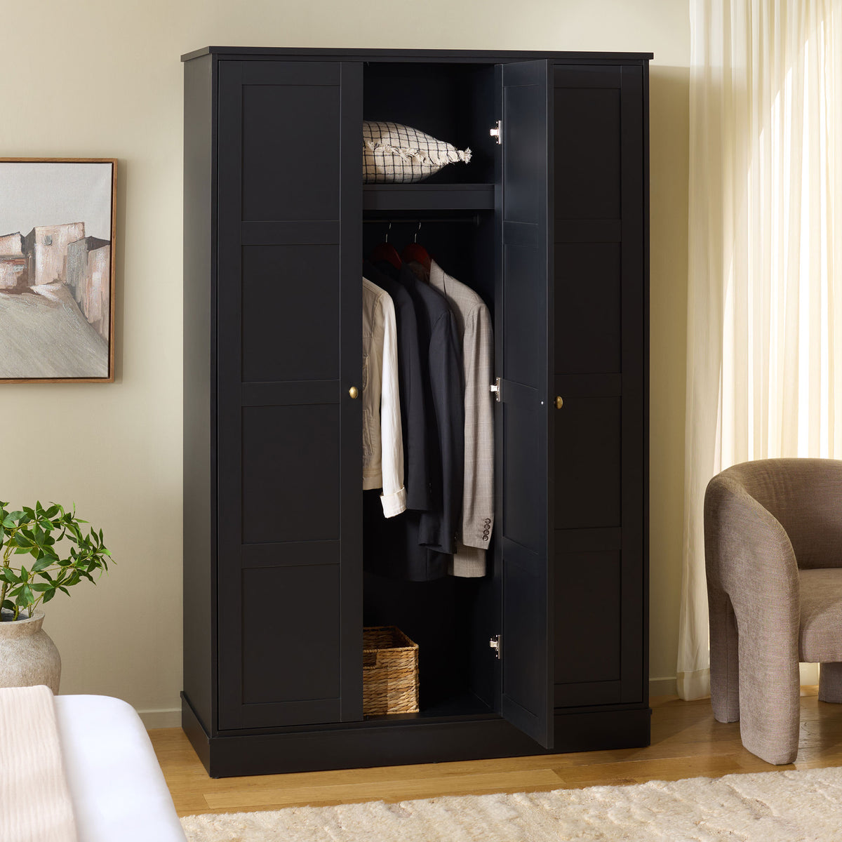 An open center door reveals hanging clothes below a shelf, with closed storage alongside. || STG3103C-3BX || front_angle_open_room