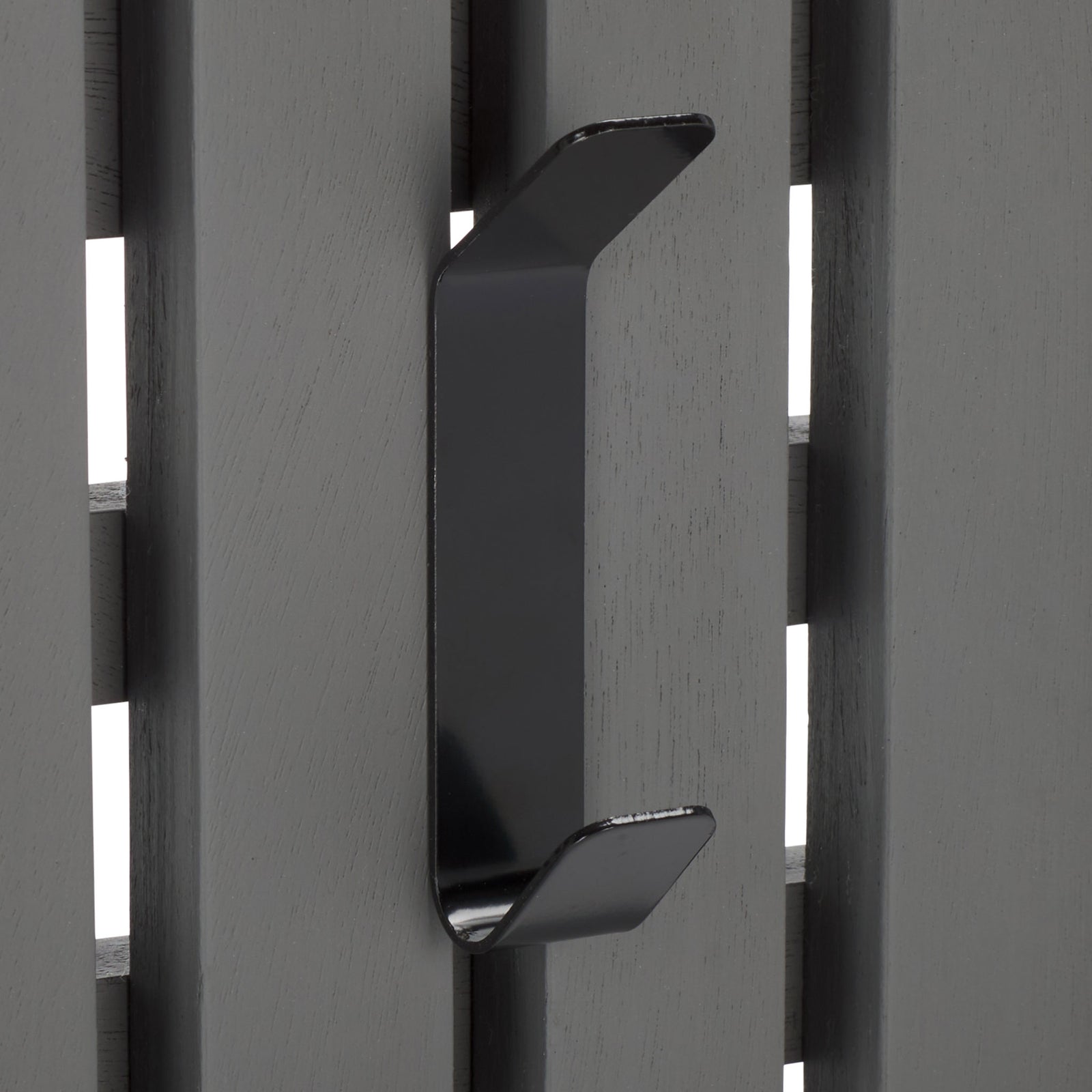 A black double hook sits against cool gray wood slats, offering two places for coats and accessories. || STG5704A || detail_studio