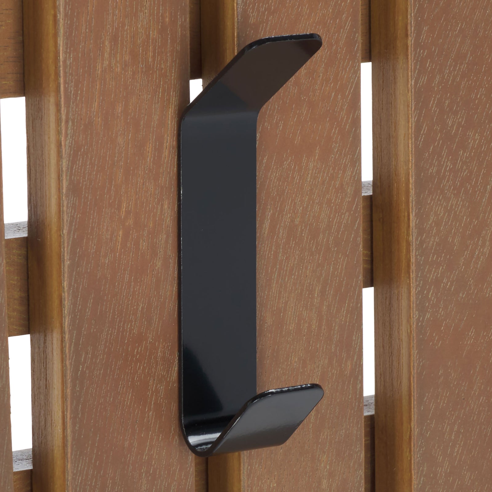 A black double hook stands out against warm sepia wood grain, keeping coats and bags close at hand. || STG5704B || detail_studio
