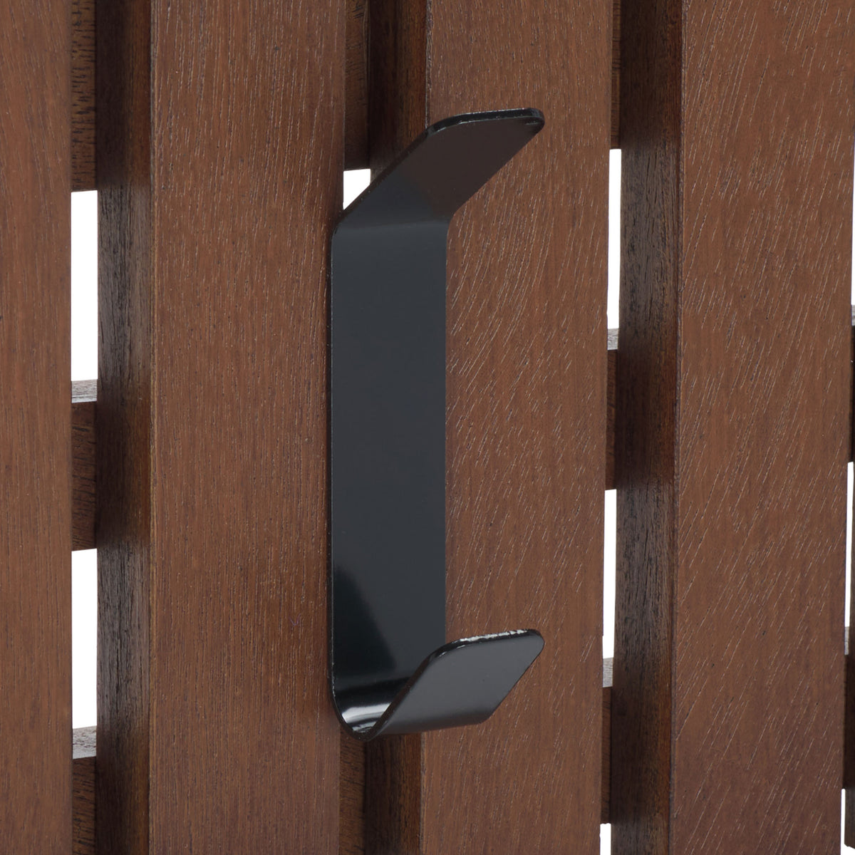 A black double hook brings bold contrast and two hanging points to walnut-toned wood slats. || STG5704D || detail_studio