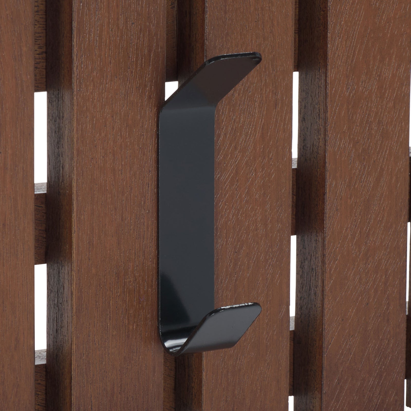 A black double hook brings bold contrast and two hanging points to walnut-toned wood slats. || STG5704D || detail_studio