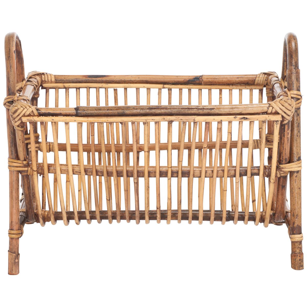 An open rattan newspaper rack pairs a slatted cradle with curved handles and sturdy legs || STG6500A || front_studio