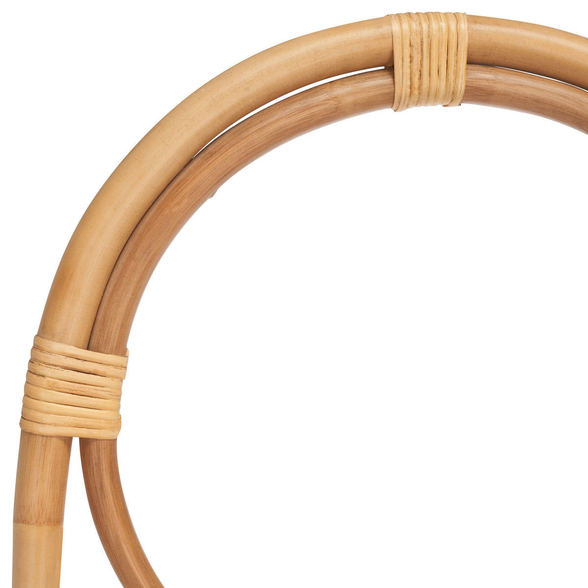 Smooth natural rattan curves meet beneath neatly wrapped bindings at the top. || STG6501A || detail_studio