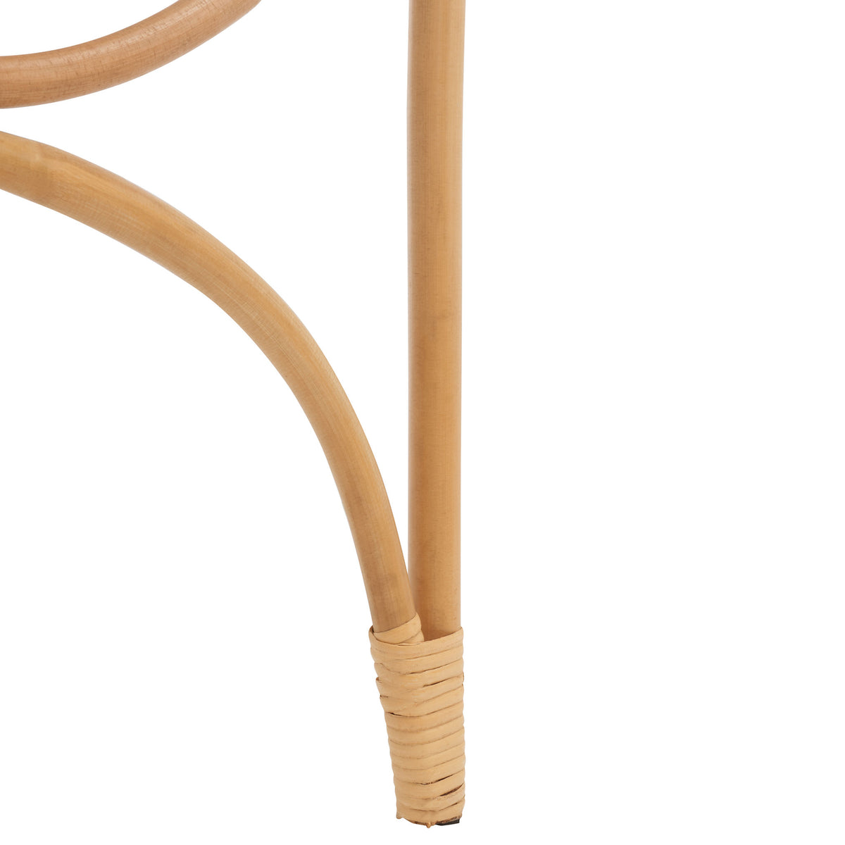 Pale rattan binding secures the curved base support to a slender, tapered foot. || STG6501A || leg_studio