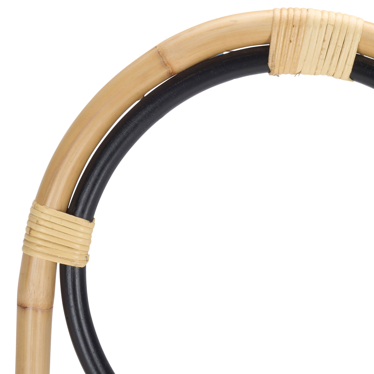 Natural rattan wrapping joins a blond outer curve to a smooth black inner hoop. || STG6501D || detail_studio