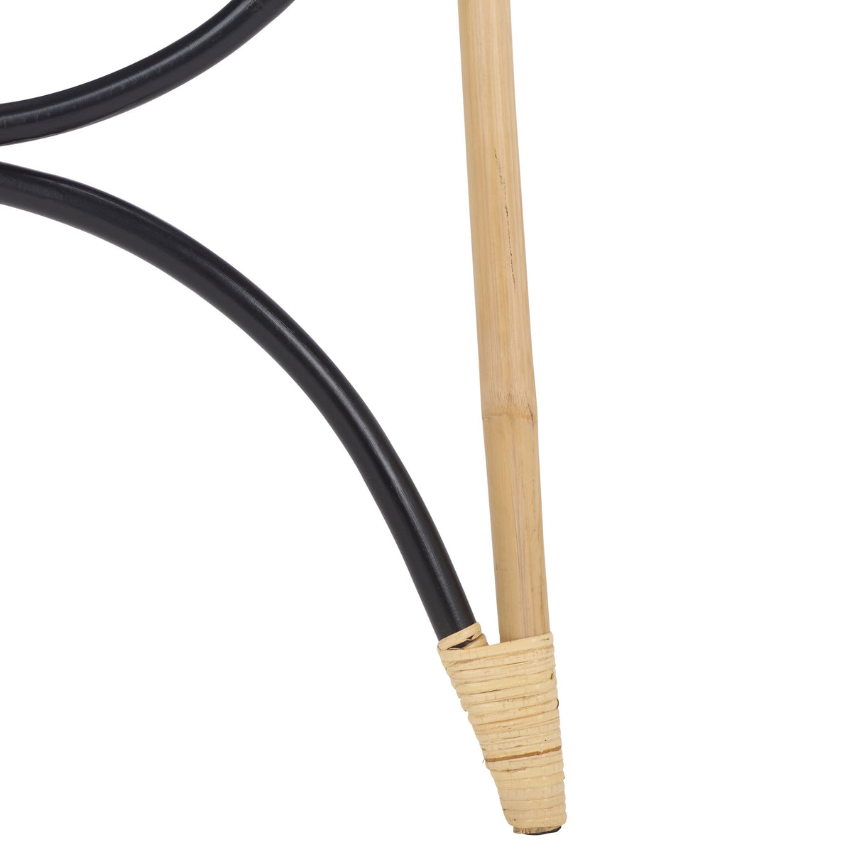 Wrapped natural rattan binding secures the blond foot beside a black curved brace. || STG6501D || leg_studio