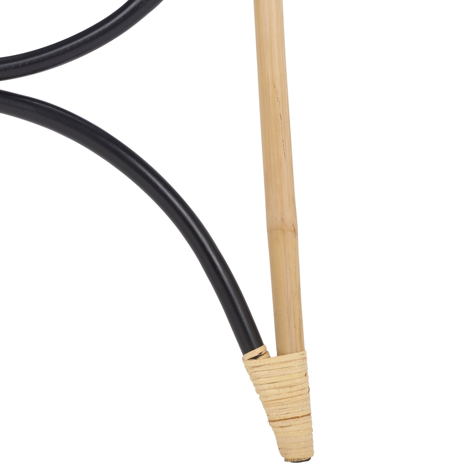 Wrapped natural rattan binding secures the blond foot beside a black curved brace. || STG6501D || leg_studio