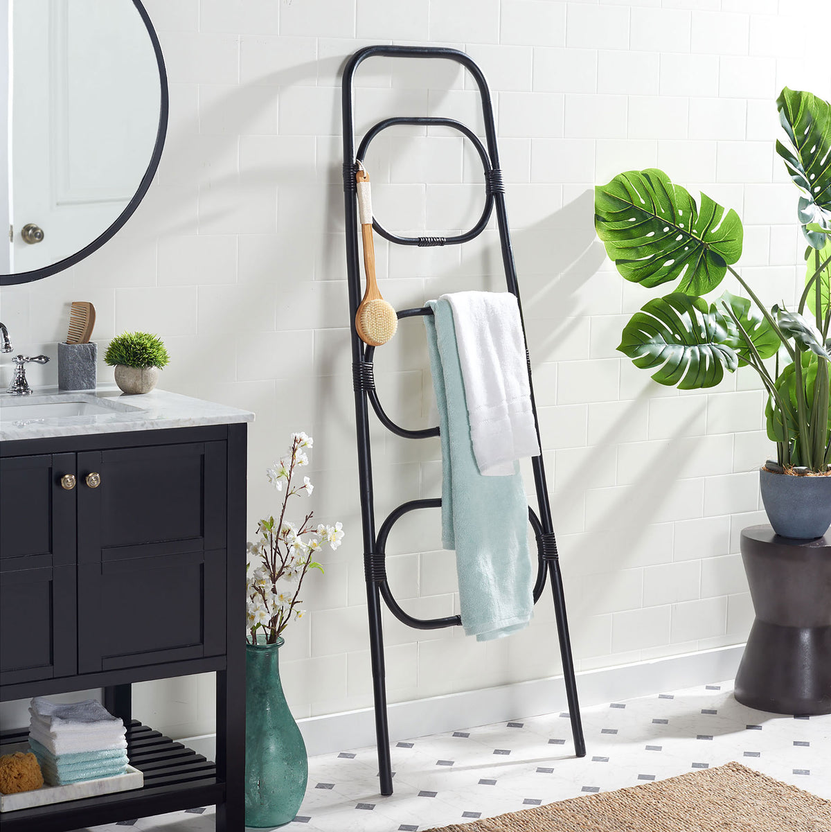 Three black rattan tiers organize bath towels beside a vanity without crowding the floor || STG6502B || front_angle_room