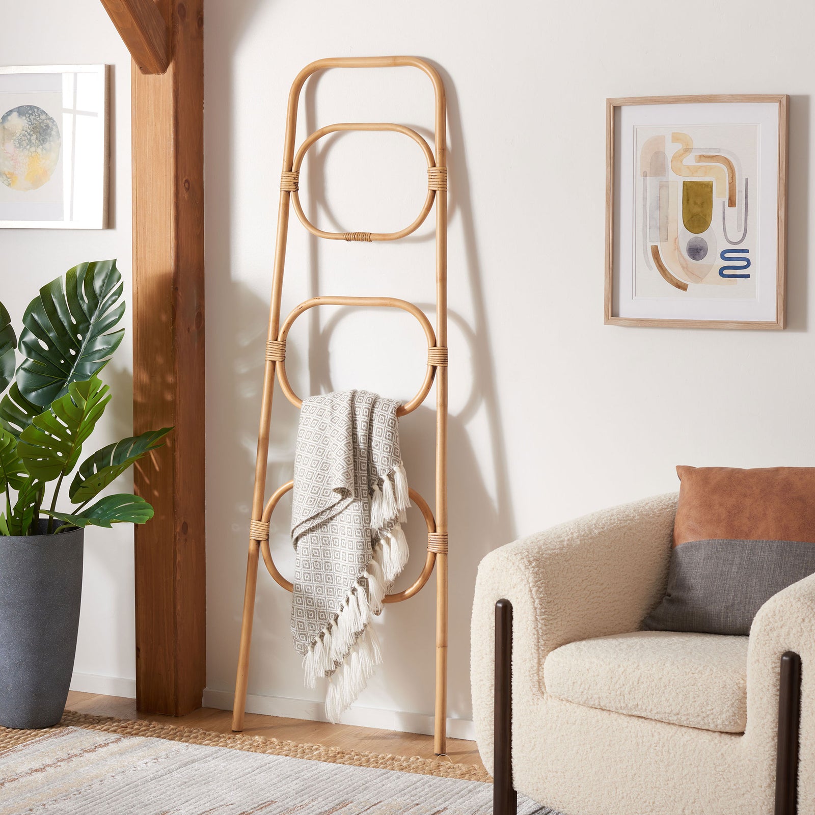 Honey brown rattan offers three sculptural tiers for a fringed throw in a relaxed living space || STG6502C || front_room