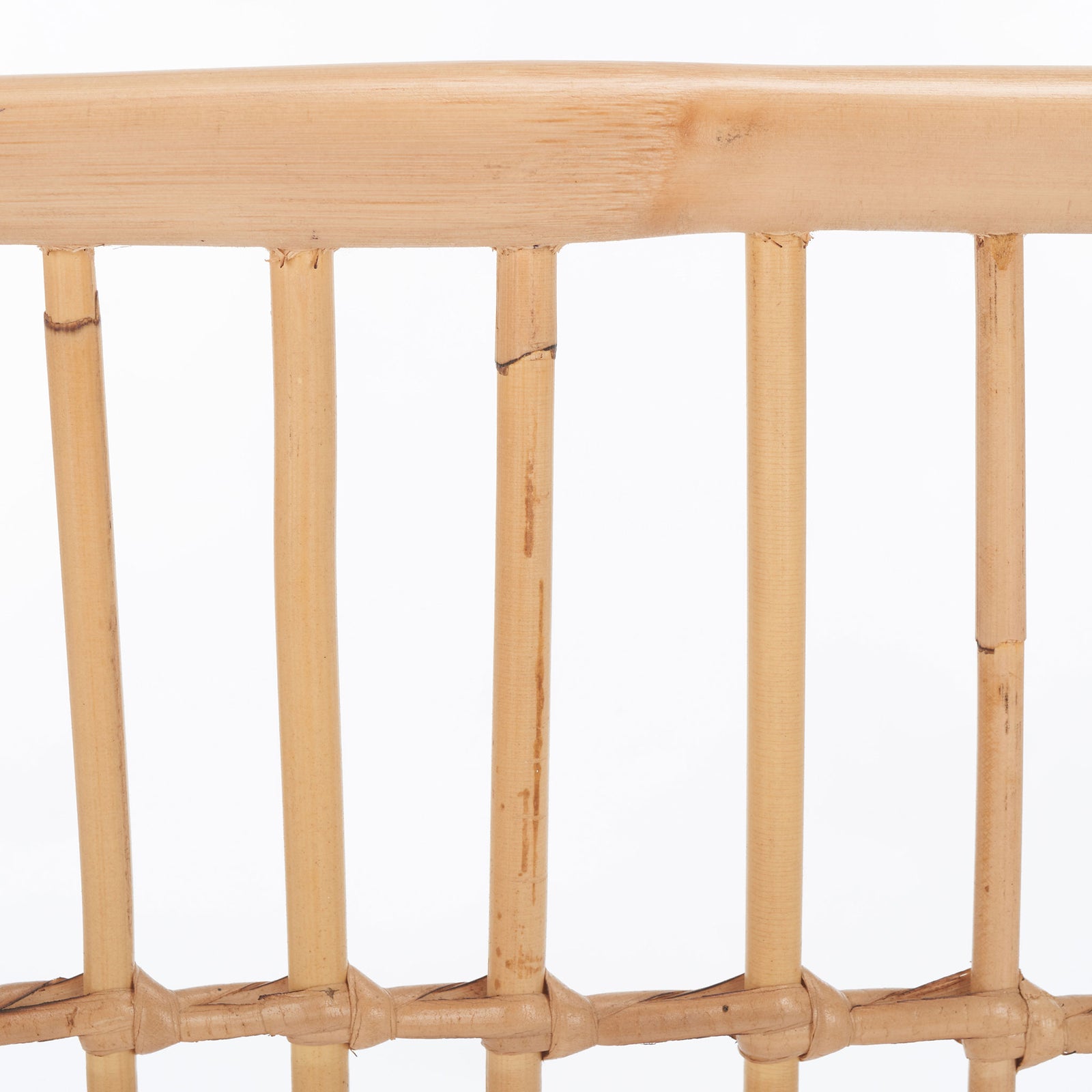 Natural rattan shows subtle grain and tonal variation across smooth rails and slender slats. || STG6505A || swatch_studio