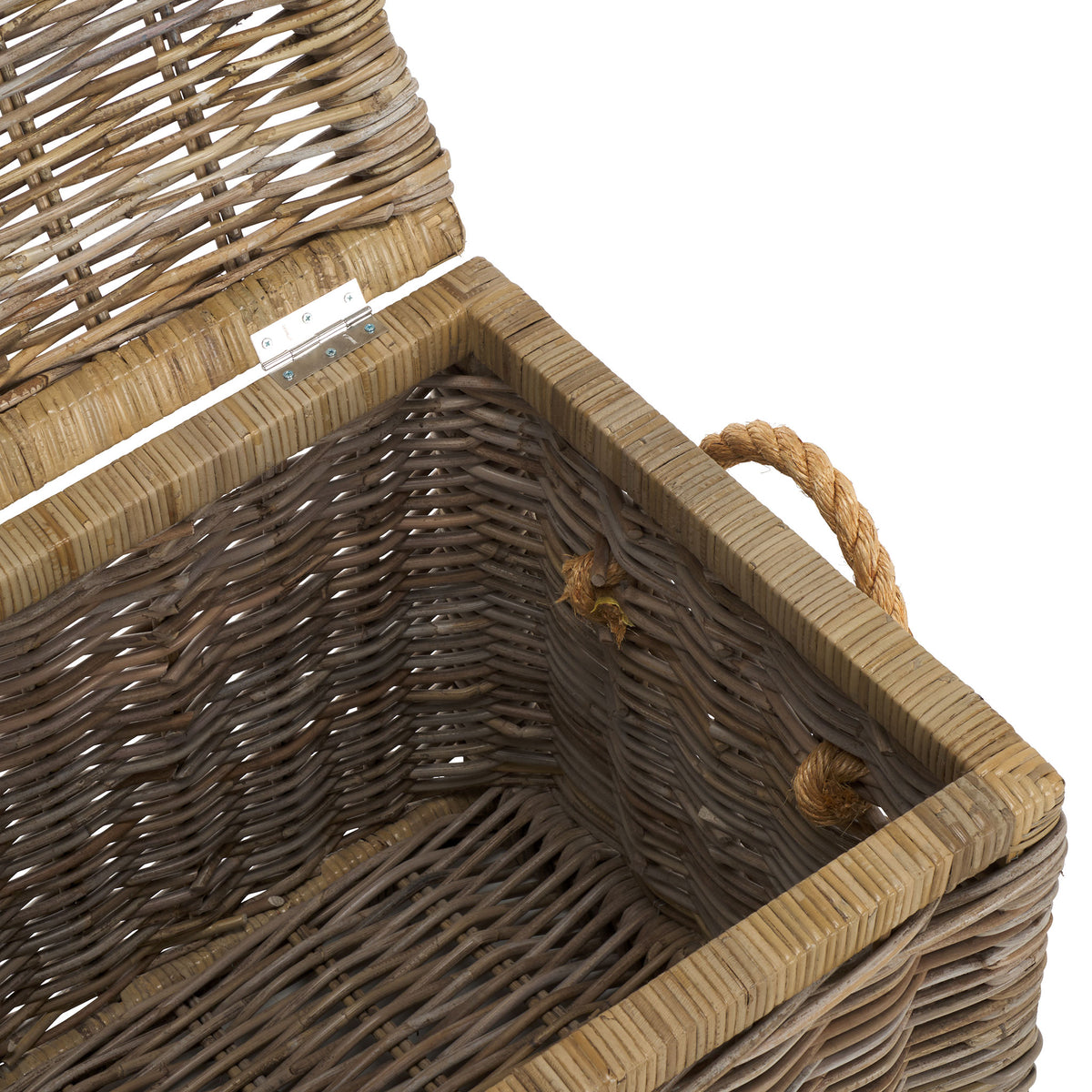 A roomy woven interior and sturdy metal hinge make it easy to stow blankets and pillows. || STG6506A || storage_open_studio