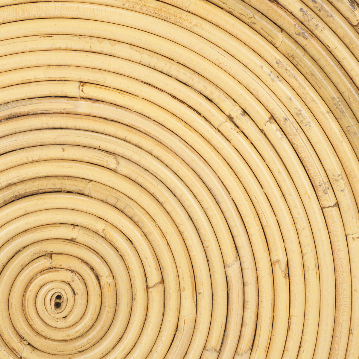 Concentric rattan coils reveal subtle grain and honey-toned variation in the woven finish. || STG6508A || swatch_studio