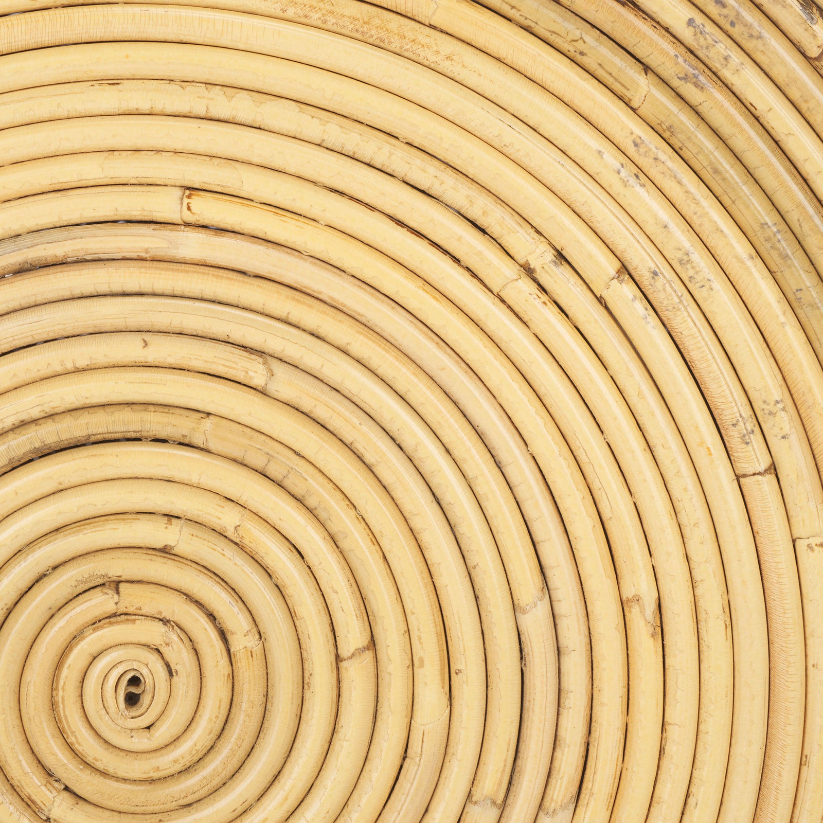 Concentric rattan coils reveal subtle grain and honey-toned variation in the woven finish. || STG6508A || swatch_studio