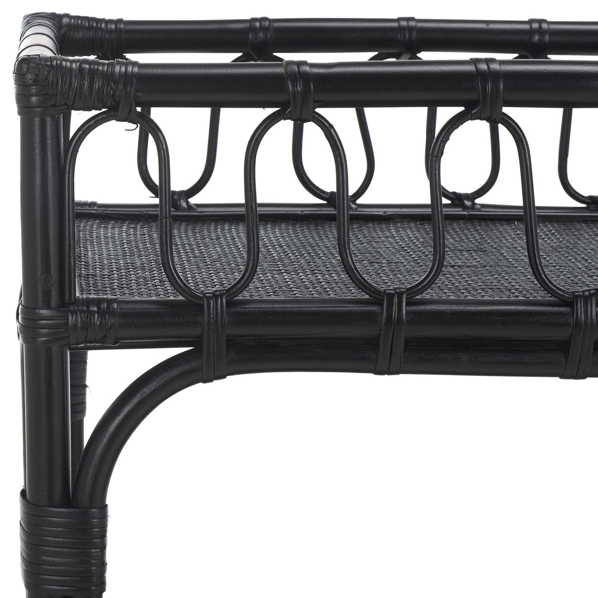 Looped black rattan rails and wrapped joints lend handcrafted texture to a woven shelf