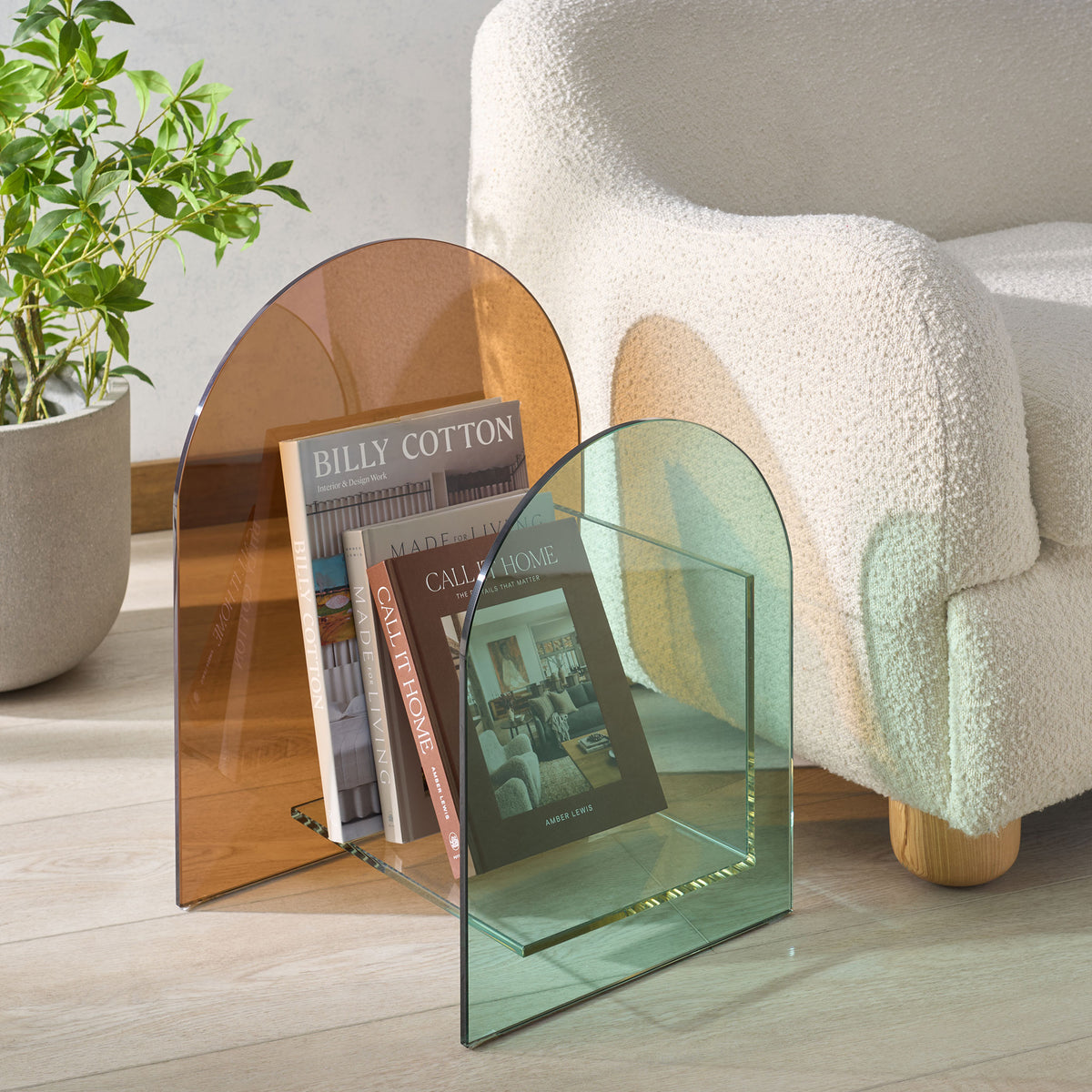 Tinted glass arches hold favorite books beside a cozy chair || STG7301A || front_angle_room
