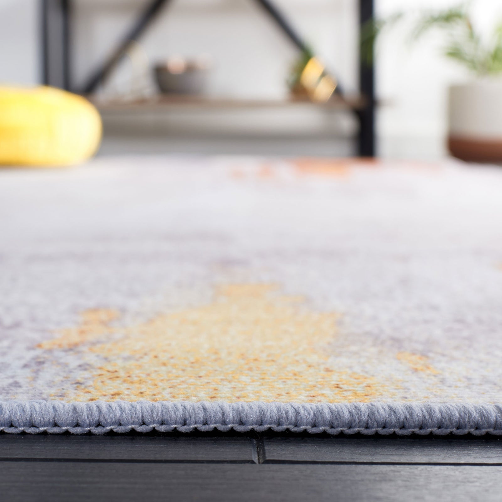 Low-profile, cushioned pile with neatly serged edging for a tidy finish || TAC801P-5 || detail_room