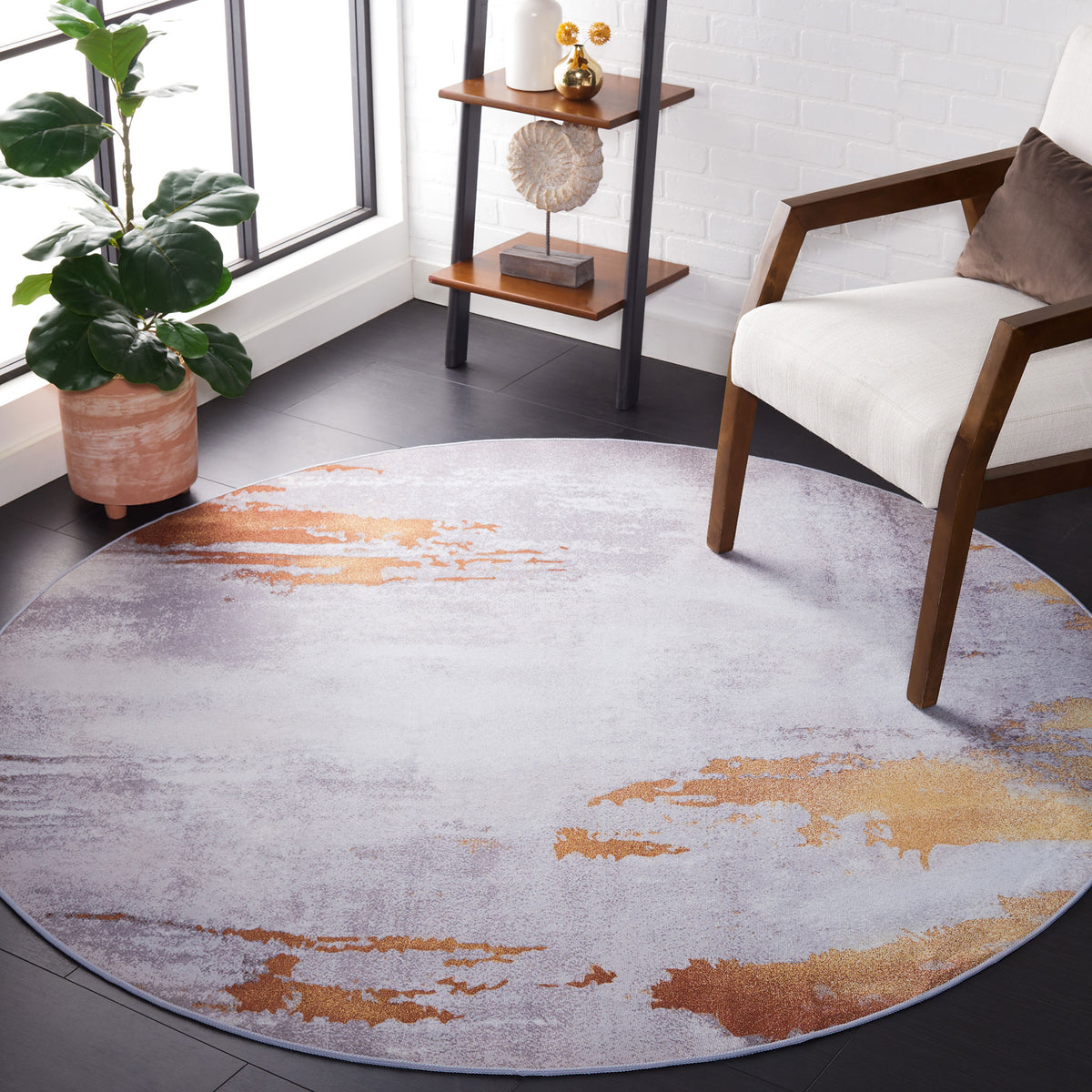 Modern round rug in gray and rust with a smooth, low-profile feel. || TAC801P-6R || top_room