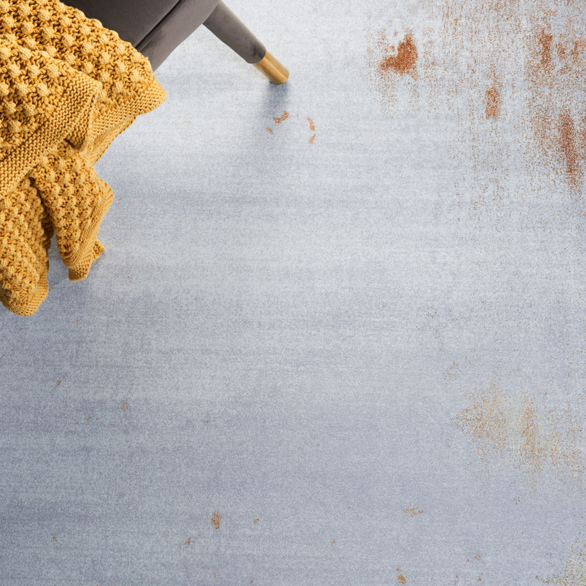 Soft gray field with warm rust highlights complements brass and velvet accents || TAC802P-5 || detail_room