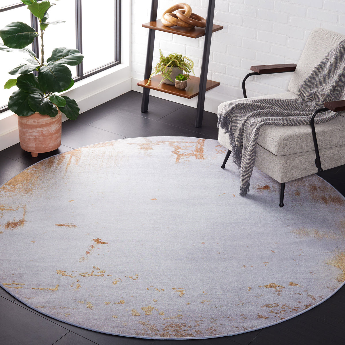 Modern gray and rust 6-foot round rug adds warm style and cushioned stability to any room || TAC802P-6R || top_angle_room