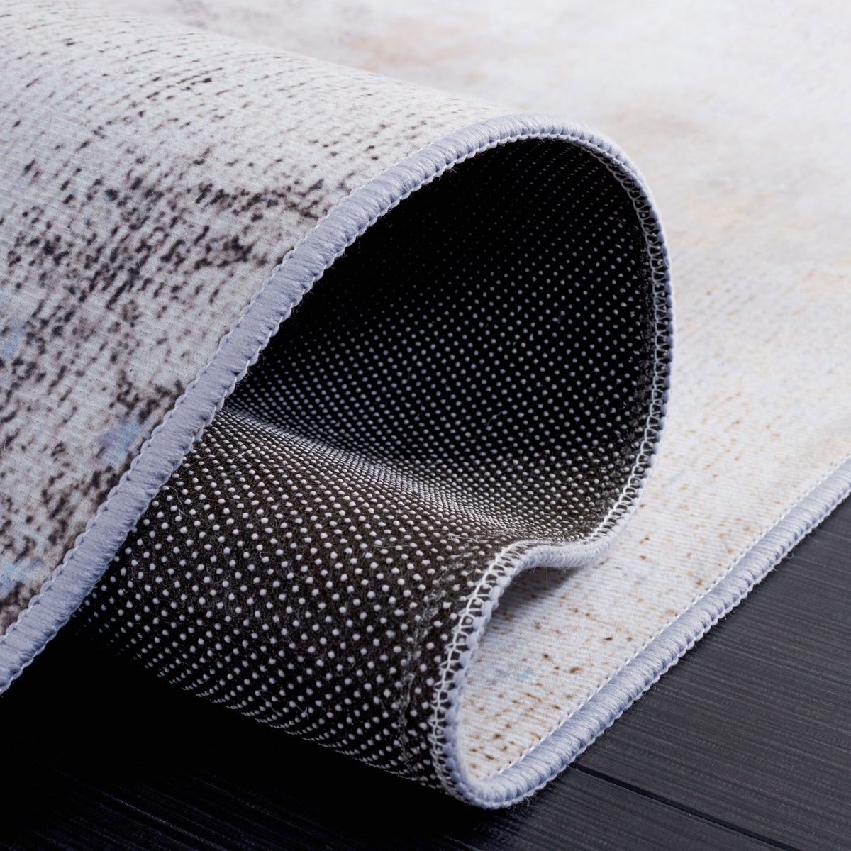 Folded edge reveals slip-resistant dotted backing and durable stitched binding || TAC805F-5 || backing_studio