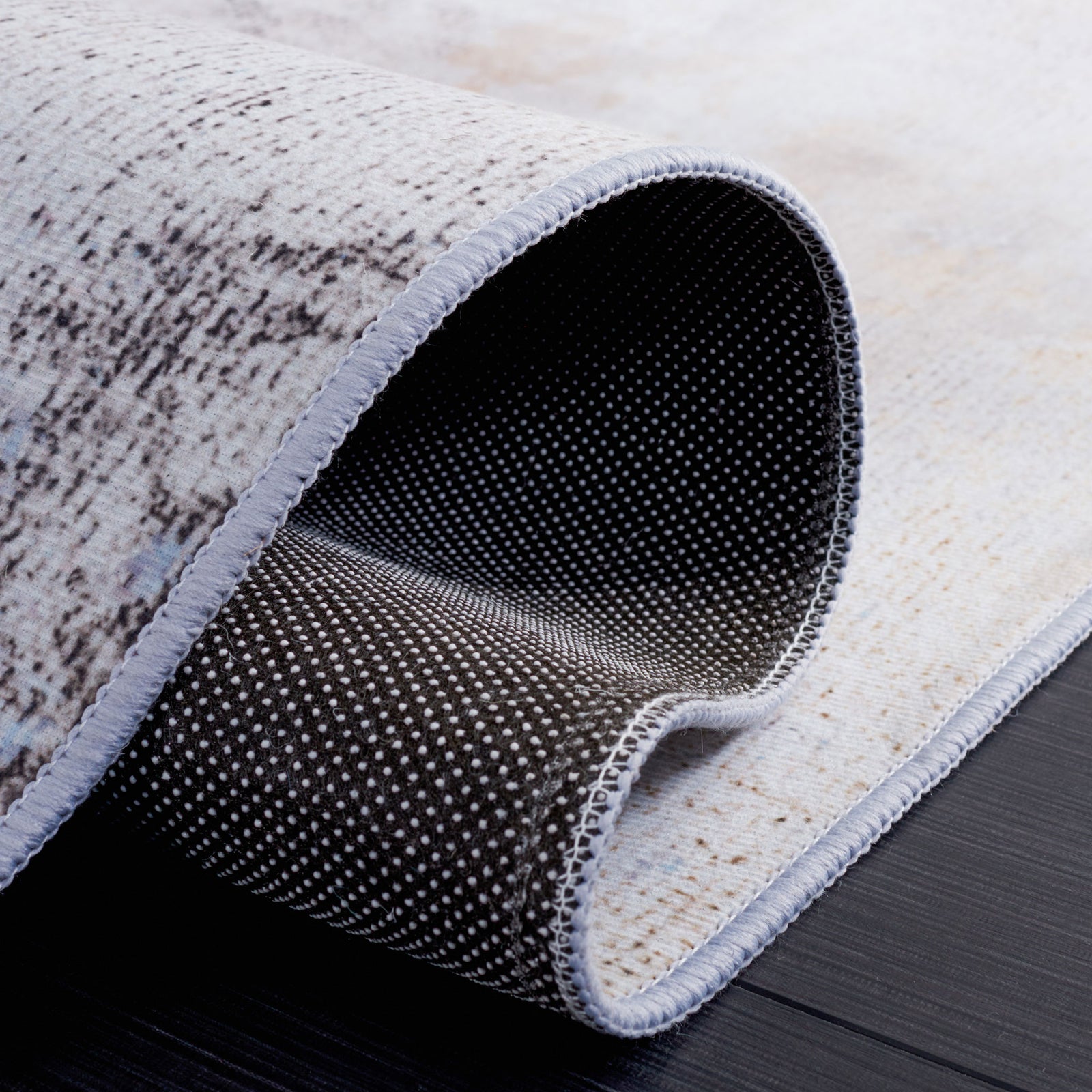 Folded edge reveals slip-resistant dotted backing and durable stitched binding || TAC805F-5 || backing_studio